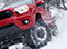 Red Toyota Tacoma built by DSI in the snow
